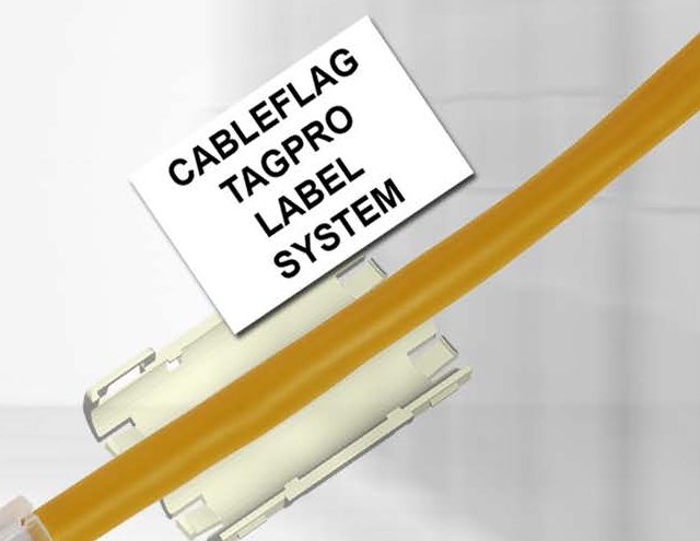 A TagPro carrier holding a printed flag label on an orange fibre cable